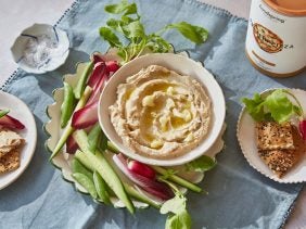 cauliflower hummus with high protein crackers and crudites