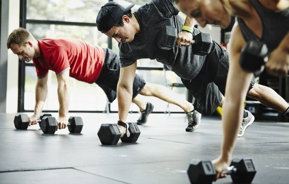 three people training together